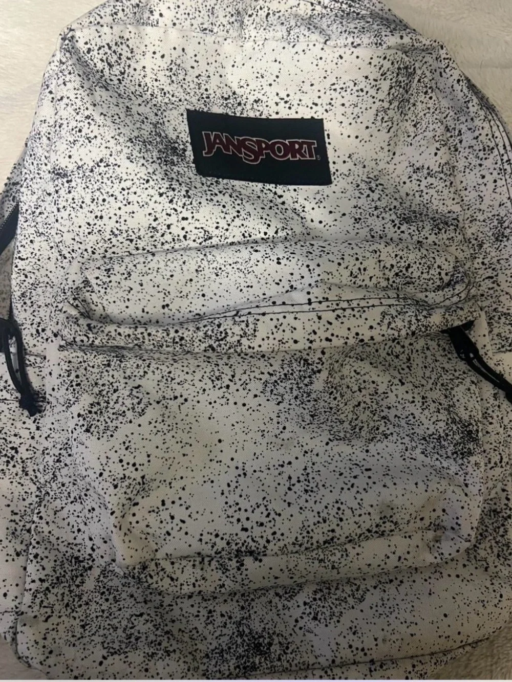 Jansport White Backpack with Black Speckle Print
